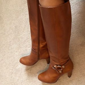 Knee high leather boot heals